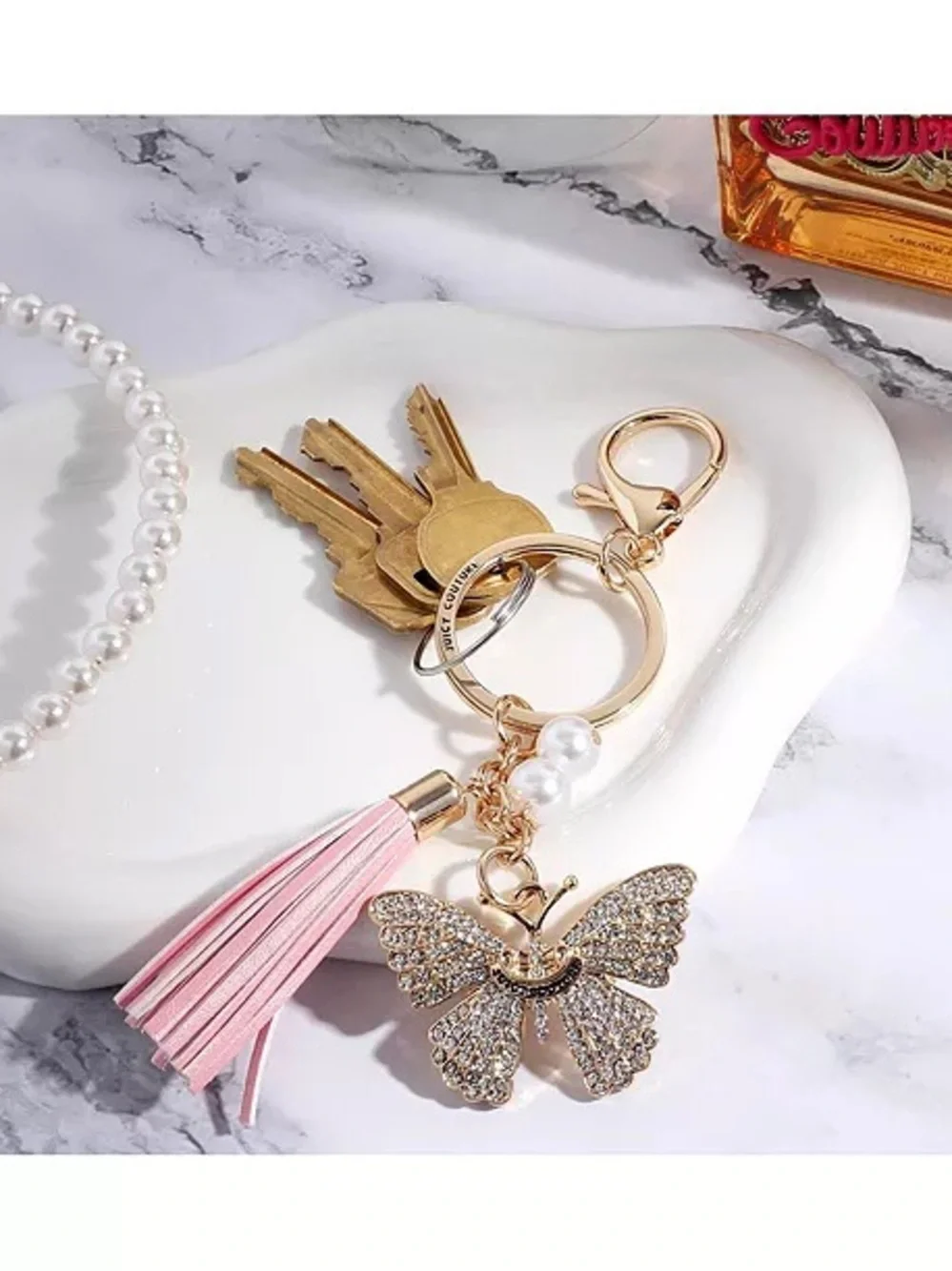 Juicy Couture Gold Crystal Butterfly Keychain with Pink Tassel